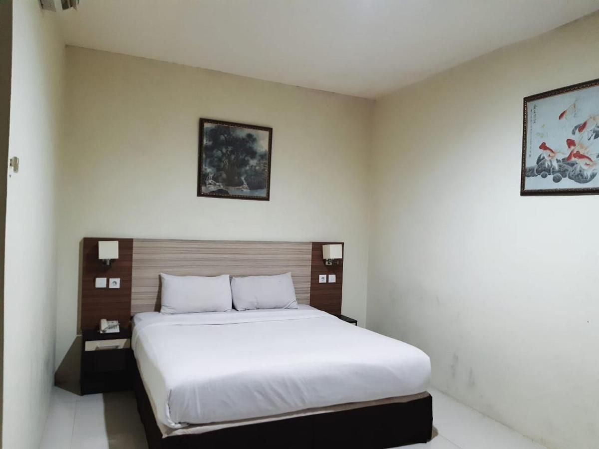 Agraha Andalas Hotel Makassar Exteriör bild